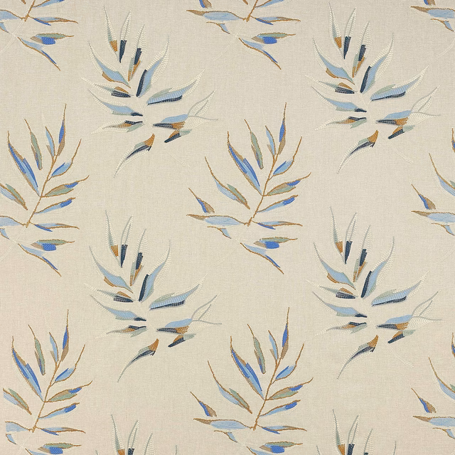 Cream fabric swatch with scattered embroidered blue and gold leafy sprays