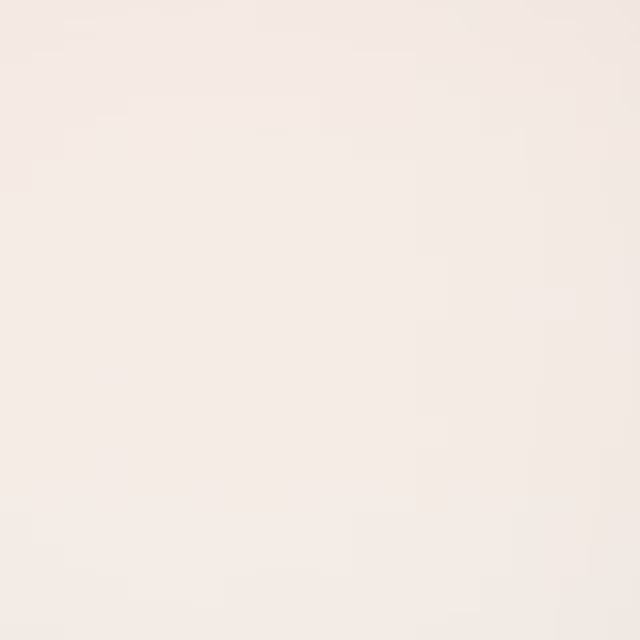 Plain soft ivory cream fabric swatch with a smooth, even woven surface