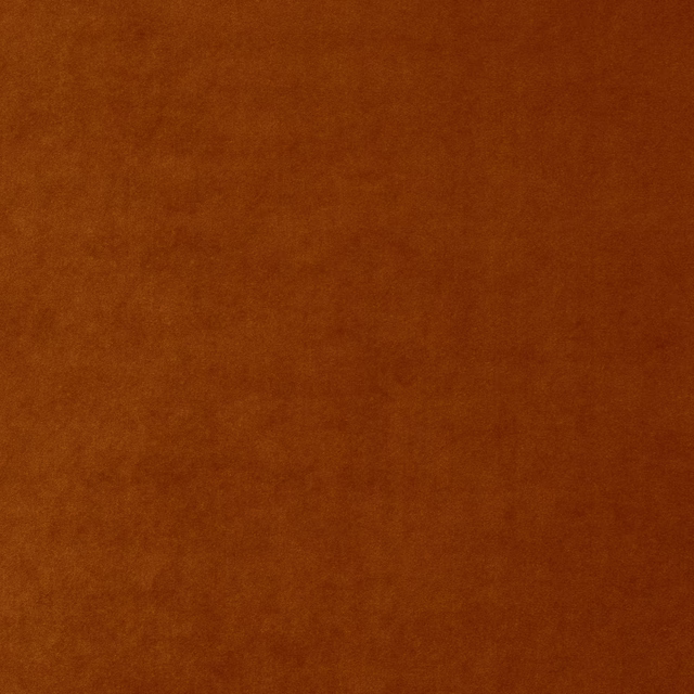 Warm burnt terracotta plain fabric with a soft, dense surface