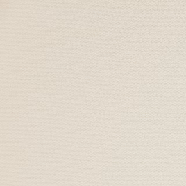 Close-up of a warm ivory plain woven fabric with a fine matte texture