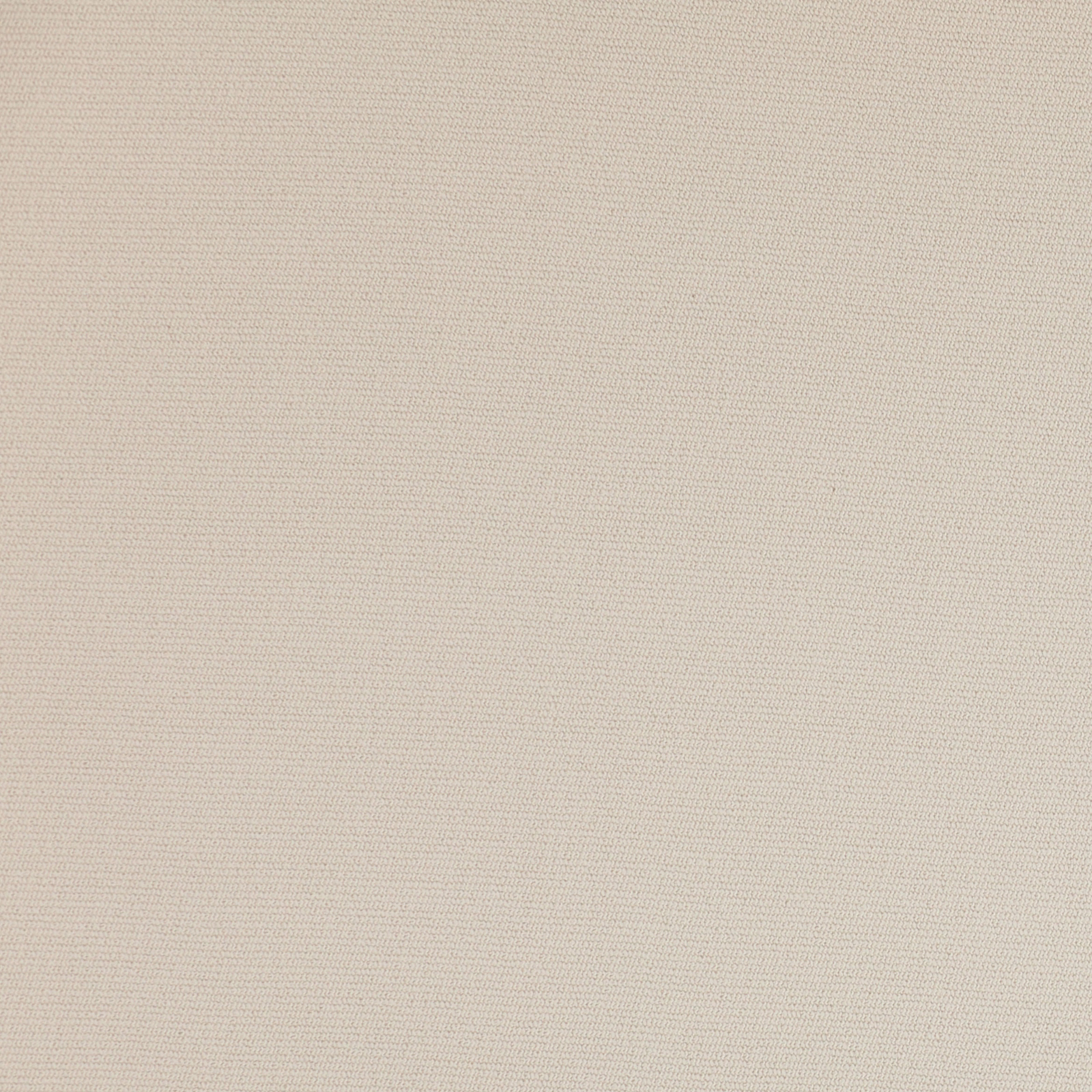 Close-up of soft parchment cream woven fabric with a fine plain texture
