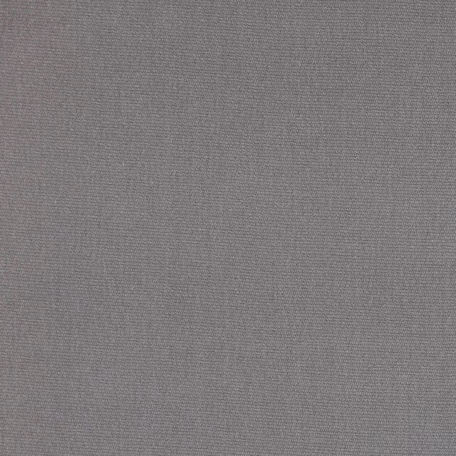 Close-up of a soft pebble grey plain woven fabric with fine texture