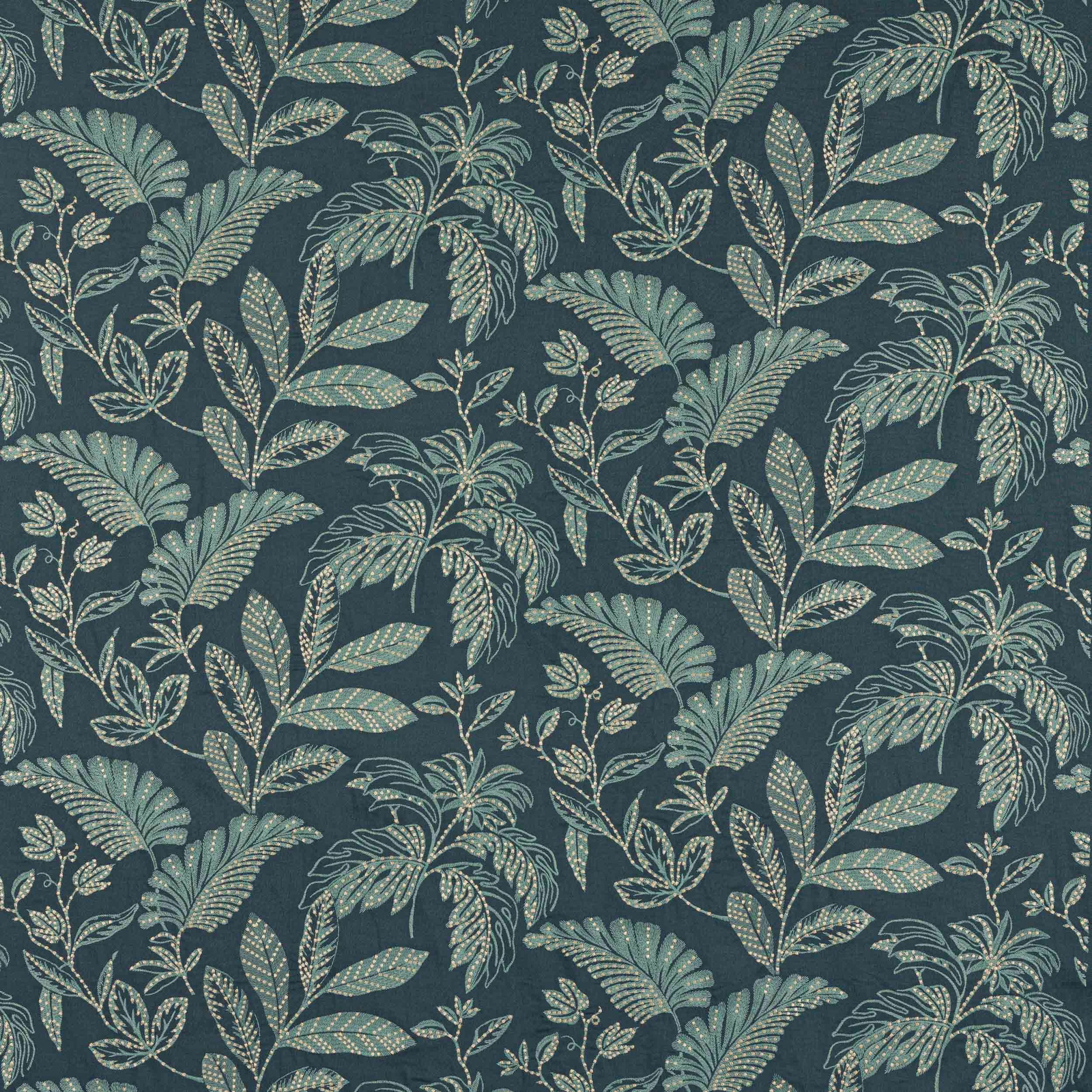 Botanical patterned fabric in deep indigo teal with pale green leafy motifs