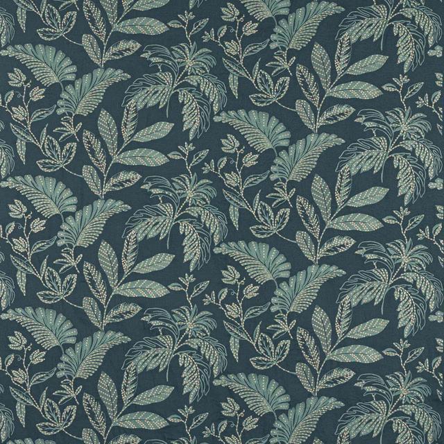 Botanical patterned fabric in deep indigo teal with pale green leafy motifs