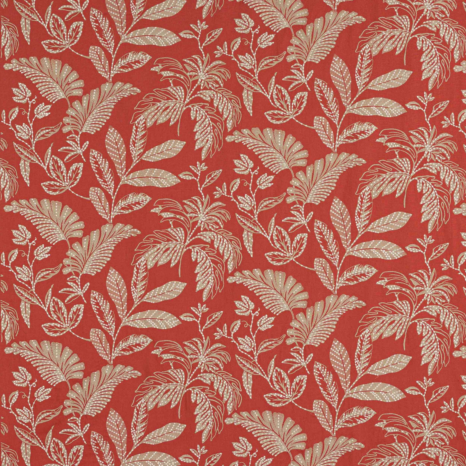 Red botanical fabric with cream leaf-and-fern pattern on a textured ground