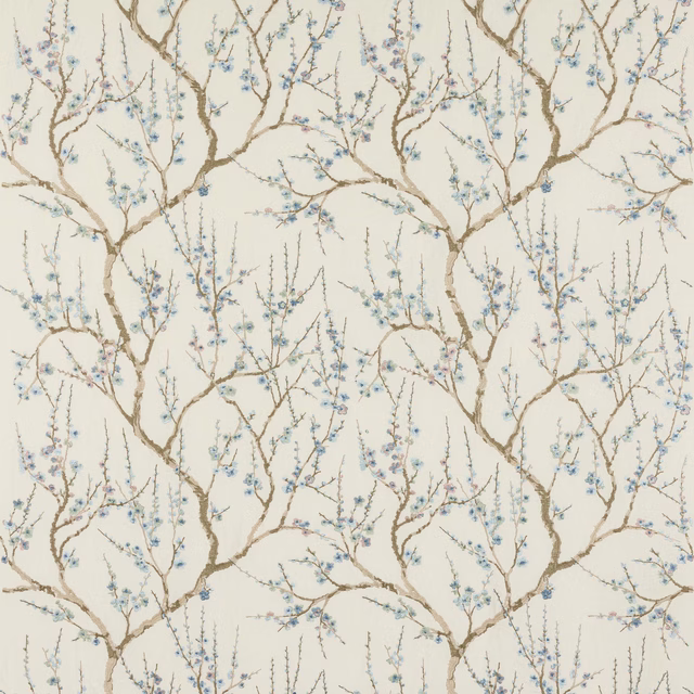 Cream fabric with branching botanical pattern in soft blue and taupe