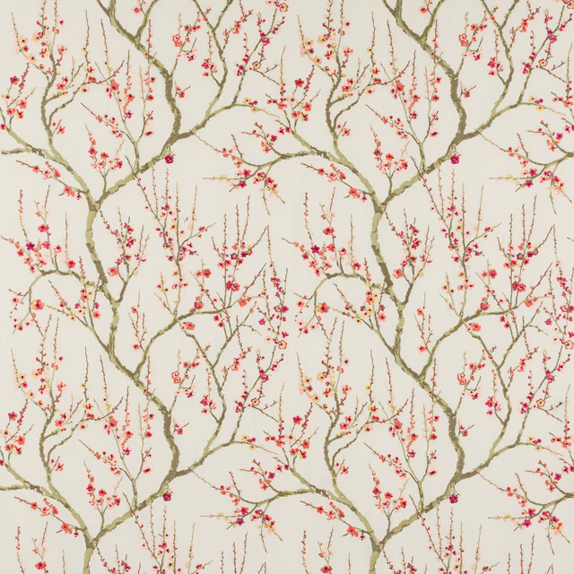Branching botanical fabric with pink blossom sprigs on an ivory ground