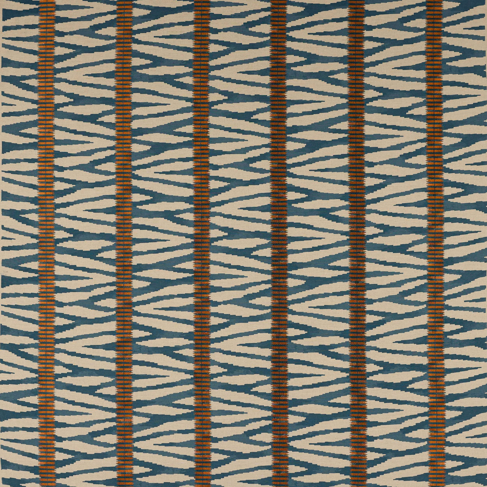 Indigo and rust woven zigzag stripe fabric on a pale ground