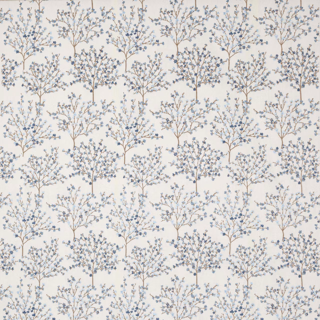 Pale botanical tree fabric with soft blue leaves on an ivory ground