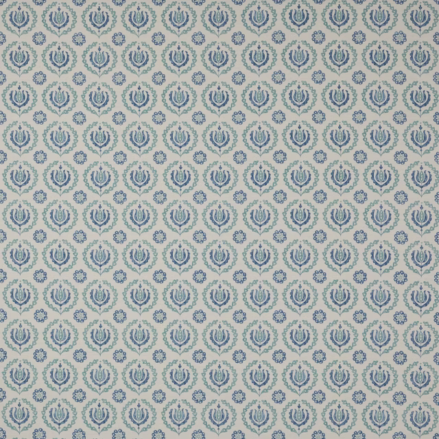 Small blue and aqua floral repeat on a pale cotton ground