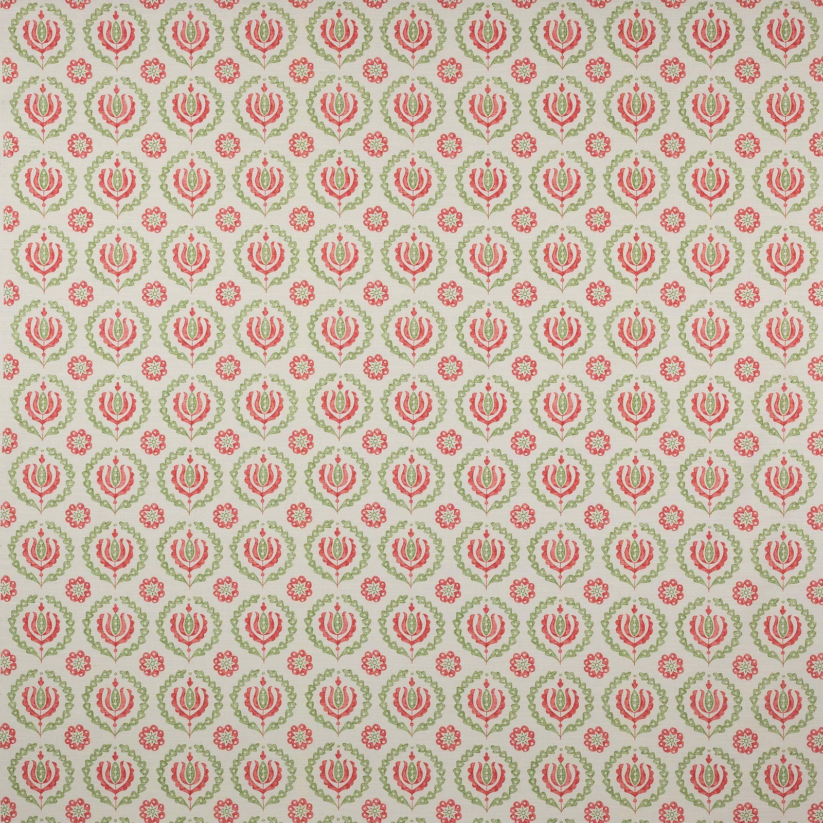 Small coral and green floral motifs on a pale ground, repeating in a neat printed pattern.