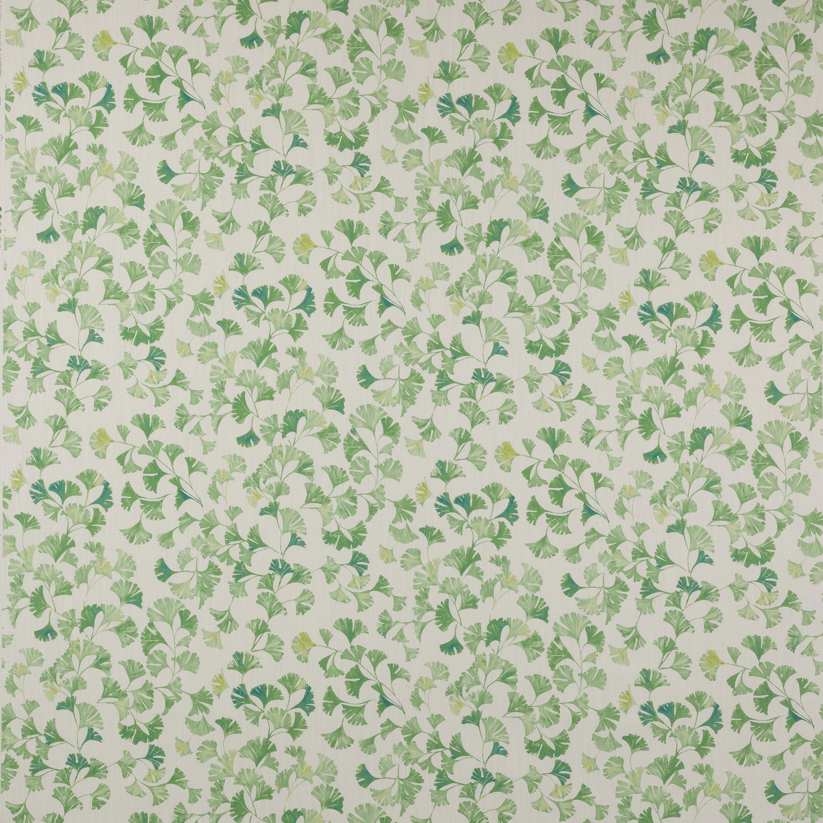 Large leafy green botanical motif on a pale ground, softly woven fabric