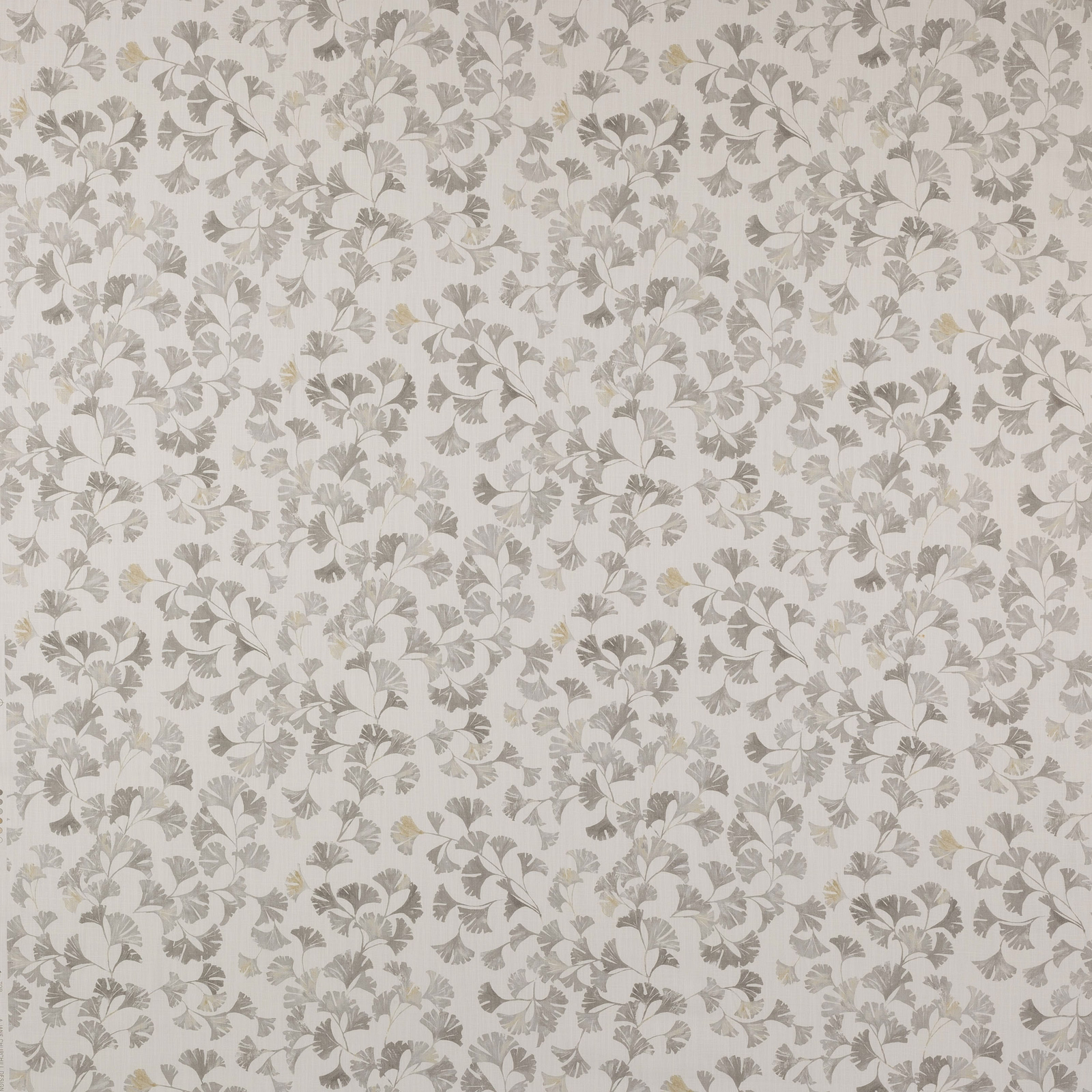 Pale floral fabric with soft grey and beige motif on an ivory ground