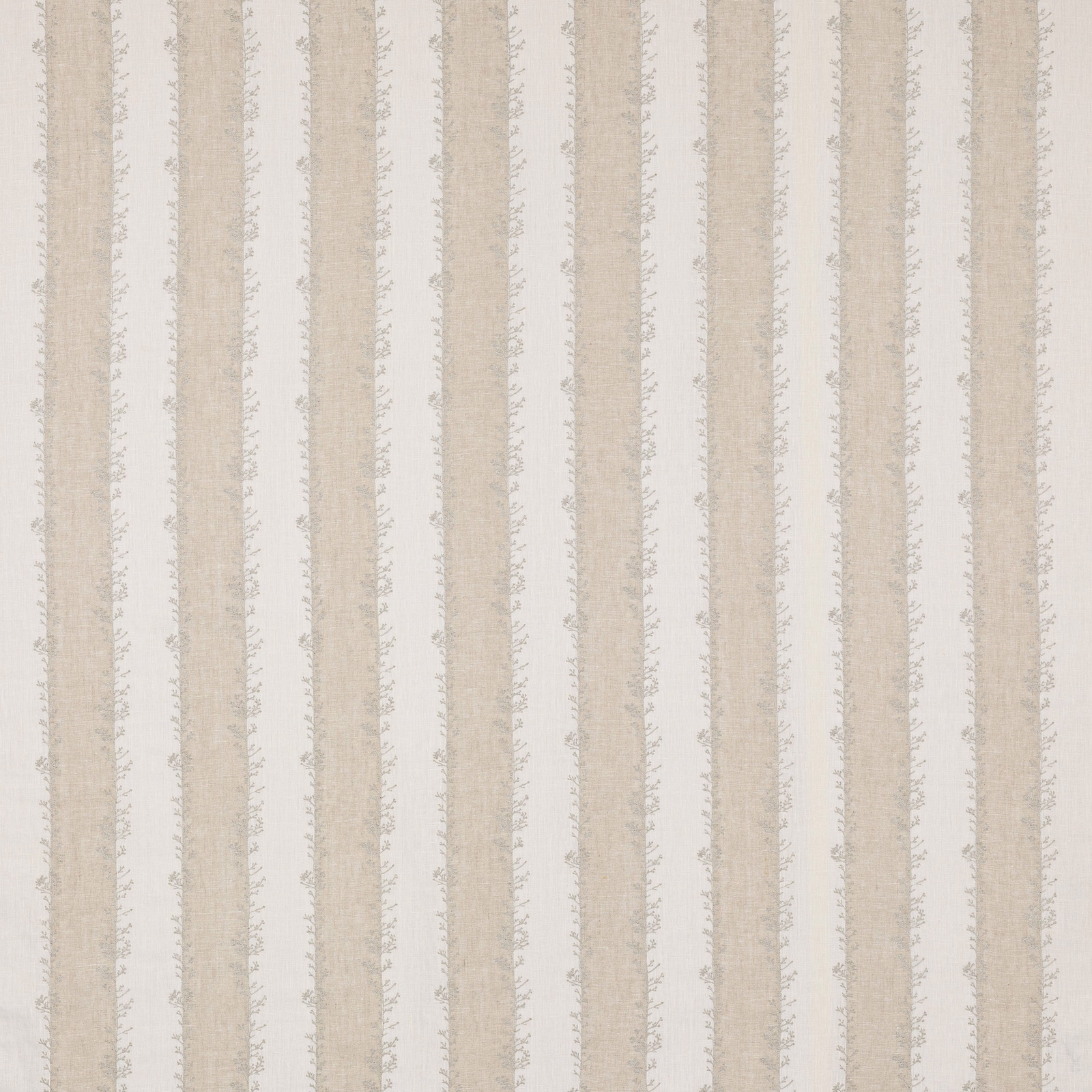 Vertical beige and ivory striped fabric with a delicate leafy edge texture