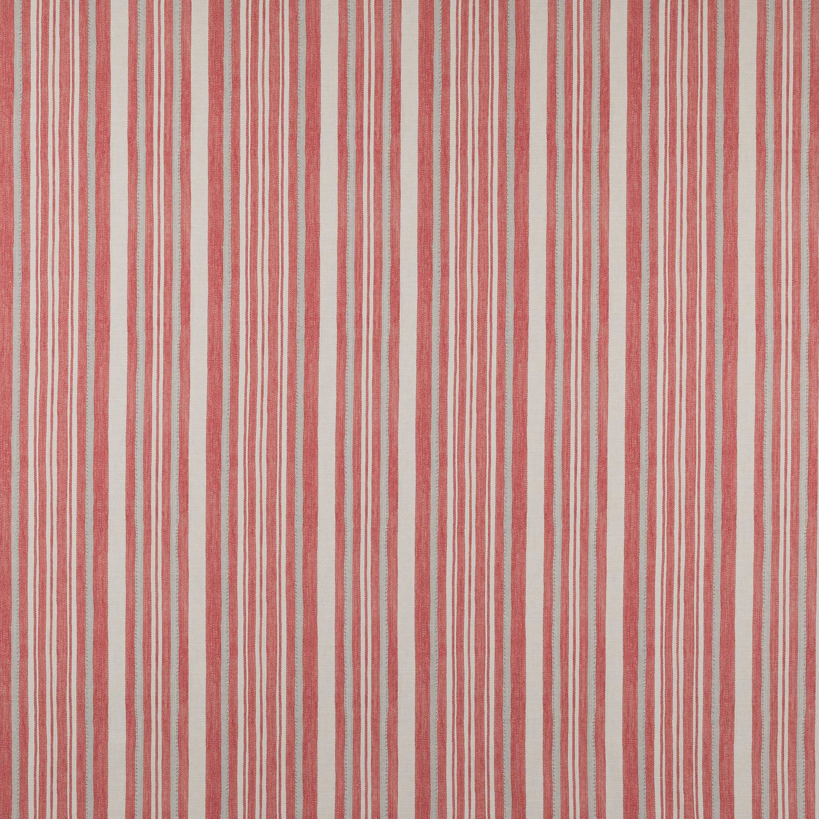 Vertical coral-red stripes on a pale cotton ground with a crisp woven texture