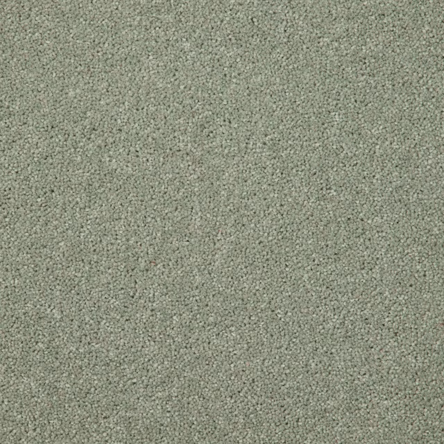 Close-up of muted sage-green Wool Twist carpet with dense, softly flecked texture