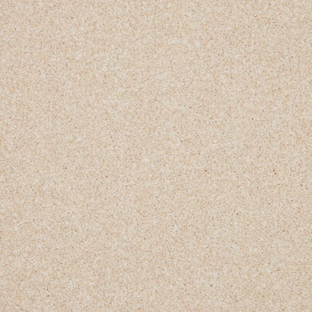 Warm cream-beige carpet with softly flecked, close-textured Saxony pile