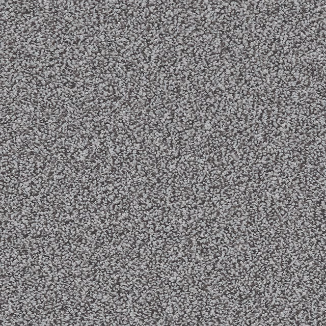 Close-up of cool grey carpet with dense pale and charcoal flecked texture