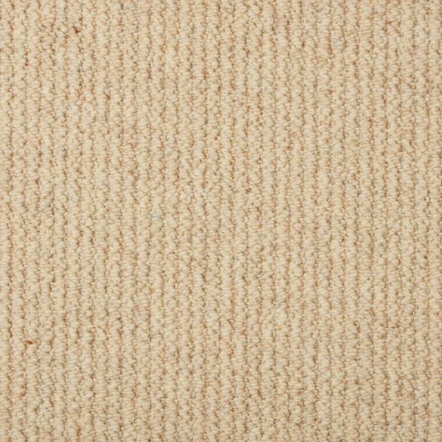 Warm oatmeal beige carpet with fine flecked vertical wool loops
