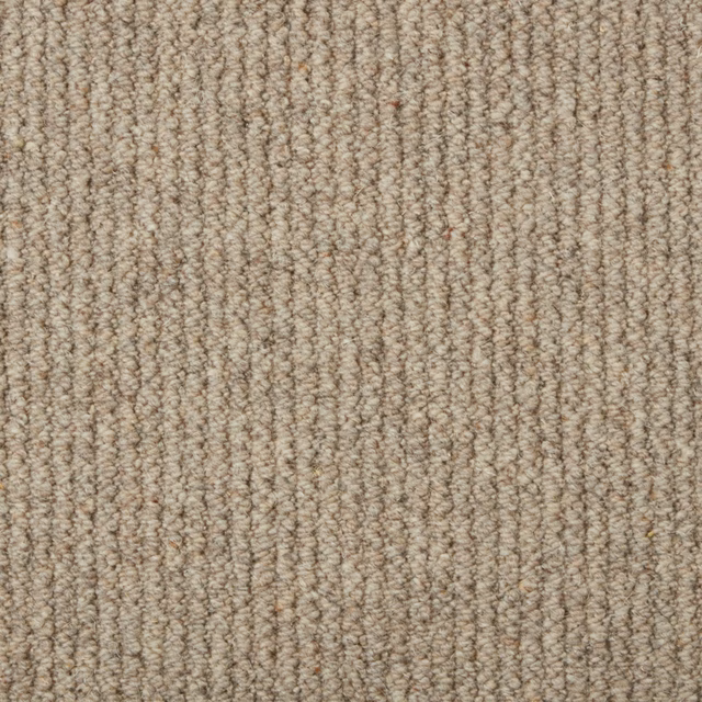 Warm cocoa beige carpet with fine vertical wool loop rows and subtle brown flecks