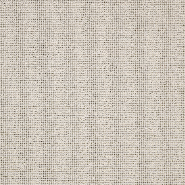 Close-up of Calico wool-loop carpet in a softly flecked oatmeal-grey neutral