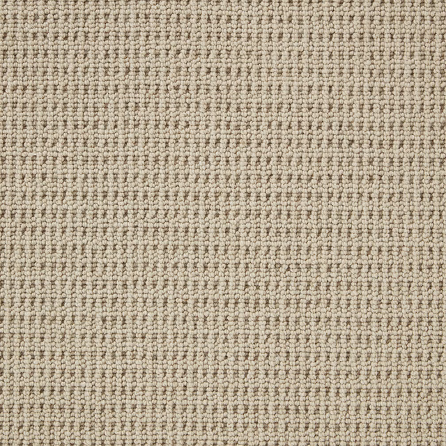 Pale warm greige Wool Loop carpet with dense, softly ridged nubby texture