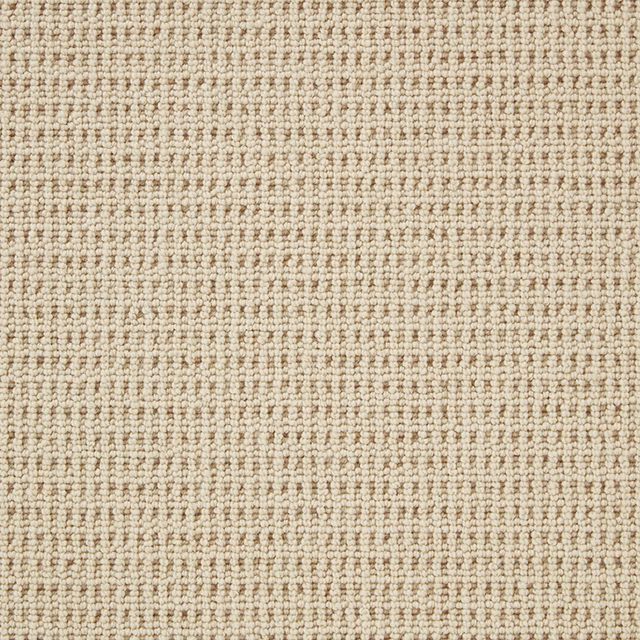 Warm oatmeal beige wool loop carpet with fine cream flecks and raised rows
