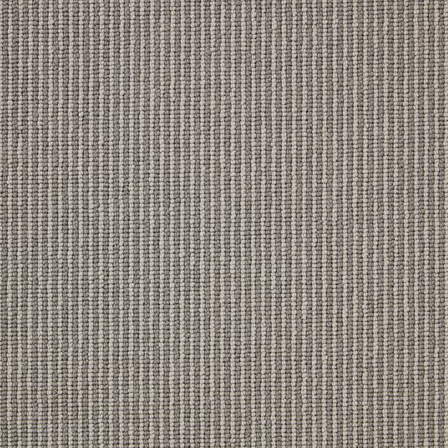 Cool grey-taupe loop carpet with fine vertical ribs and softly mottled texture