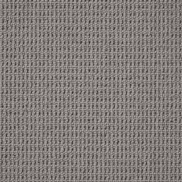 Cool ash-grey Wool Loop carpet with dense, softly mottled raised loops