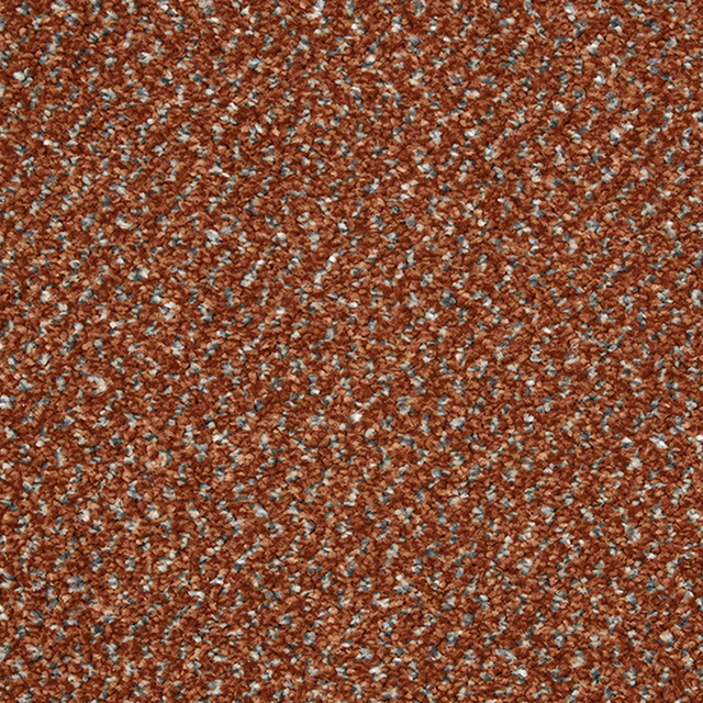 Rusty terracotta-brown carpet texture with pale blue and cream flecks in a dense tweed weave