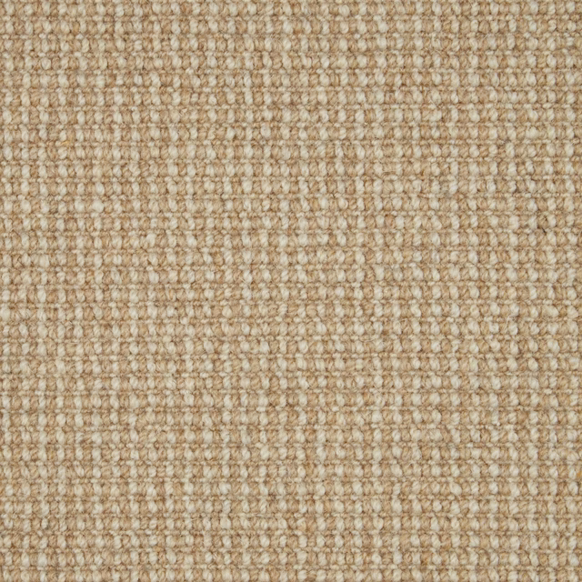 Warm oat beige wool loop carpet with softly mottled rows and tactile woven texture