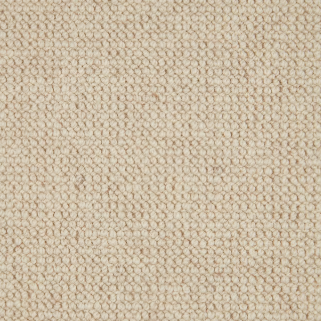 Warm oatmeal-beige wool loop with softly flecked, rounded texture