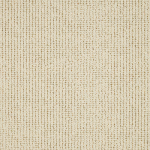 Warm ivory Wool Loop carpet with fine vertical ridges and beige flecks
