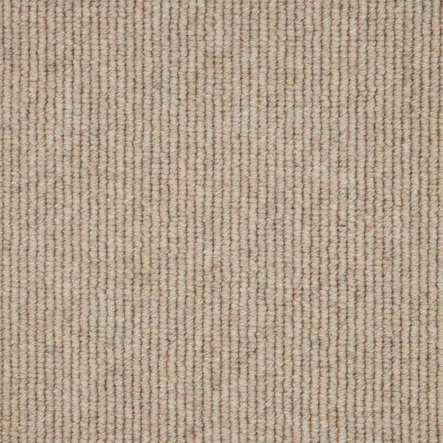 Warm oatmeal-beige wool loop carpet with fine, irregular vertical rib texture