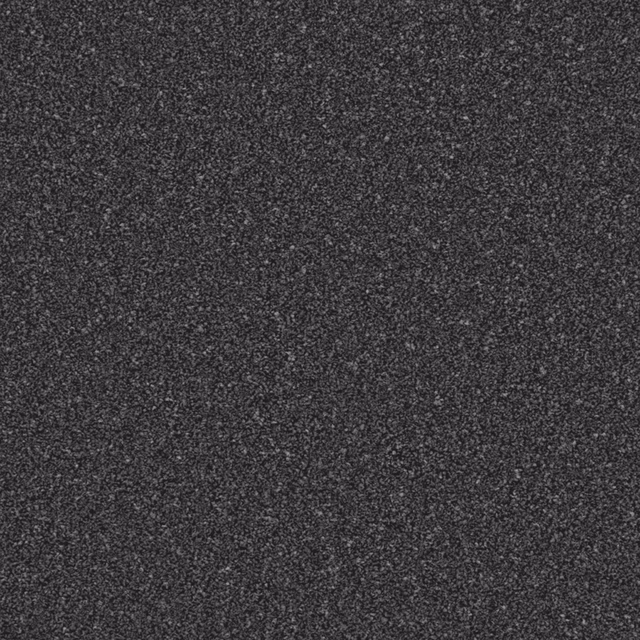 Dense anthracite carpet surface with fine charcoal and grey flecked texture