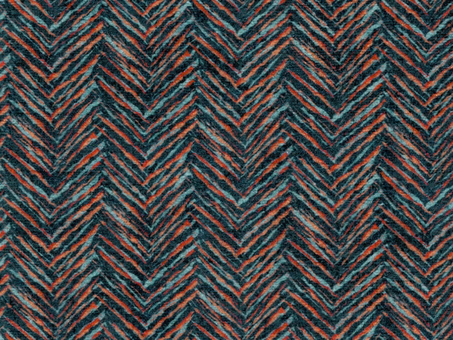 Dark teal chenille with rust coral zigzag chevrons and a soft textured pile
