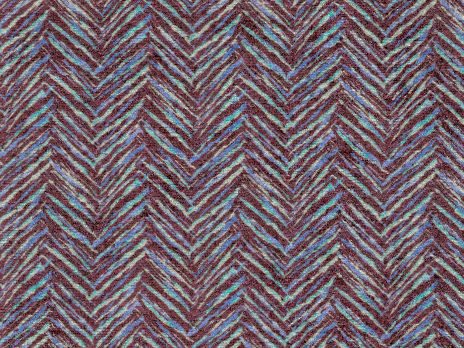 Plum chenille with teal and taupe broken chevron stripes in a tactile weave