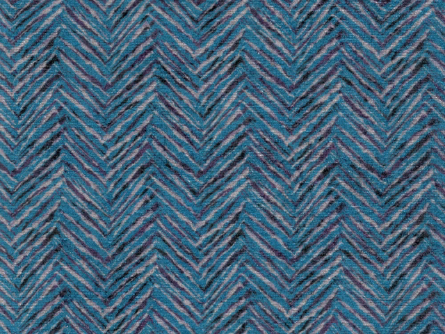 Muted blue-teal chenille with charcoal and plum chevron zigzags and a softly textured weave