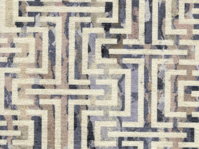 Cream chenille with taupe, slate and charcoal interlocking geometric maze pattern