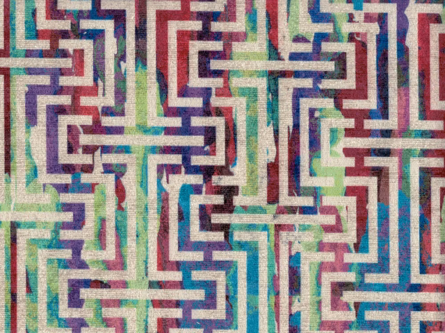 Multicoloured chenille with angular maze lines in teal, burgundy, purple and cream