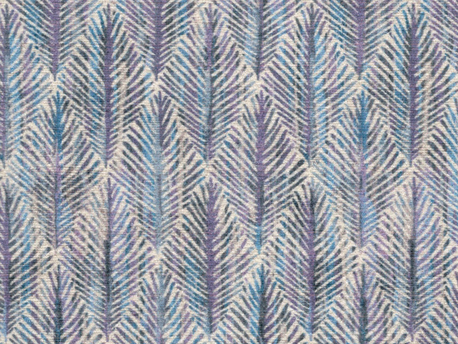 Blue-grey chenille with teal and lilac feathered chevrons in a close woven pattern