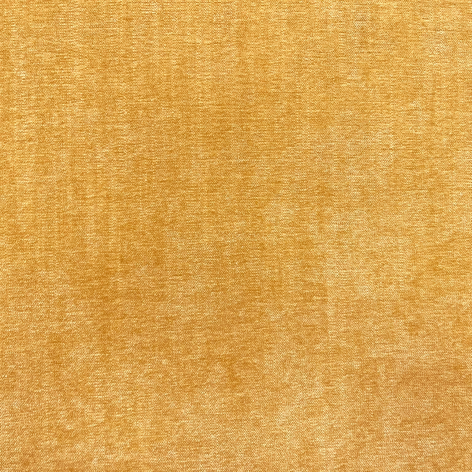 Warm ochre-gold chenille swatch with fine mottled weave and softly textured surface