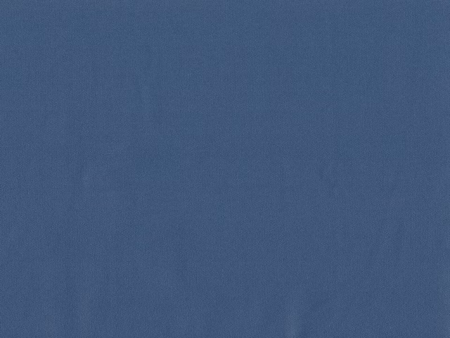 Muted slate-blue flat weave with subtle tonal variation across the surface