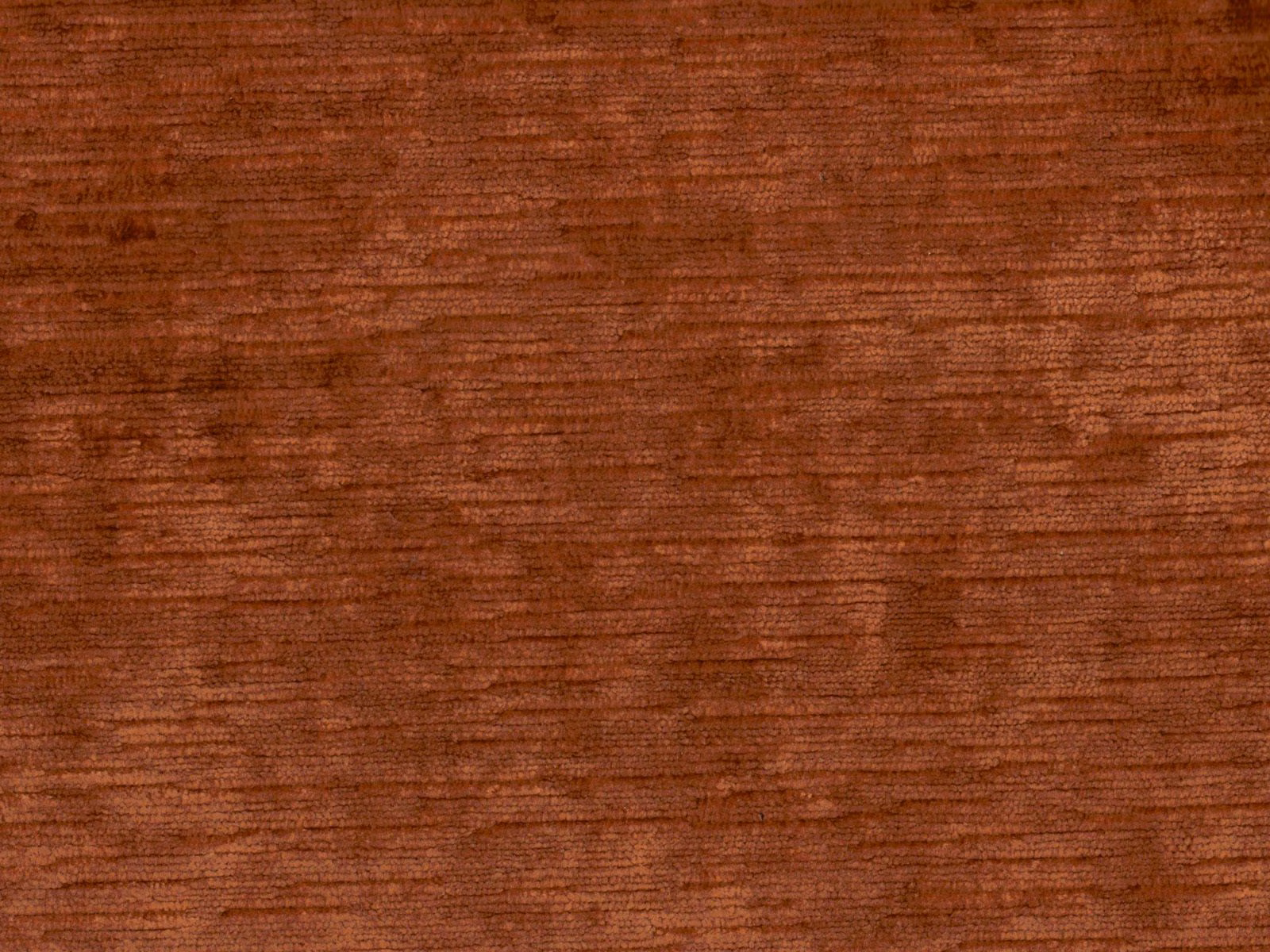 Warm russet-brown velvet with fine horizontal pile lines and copper highlights