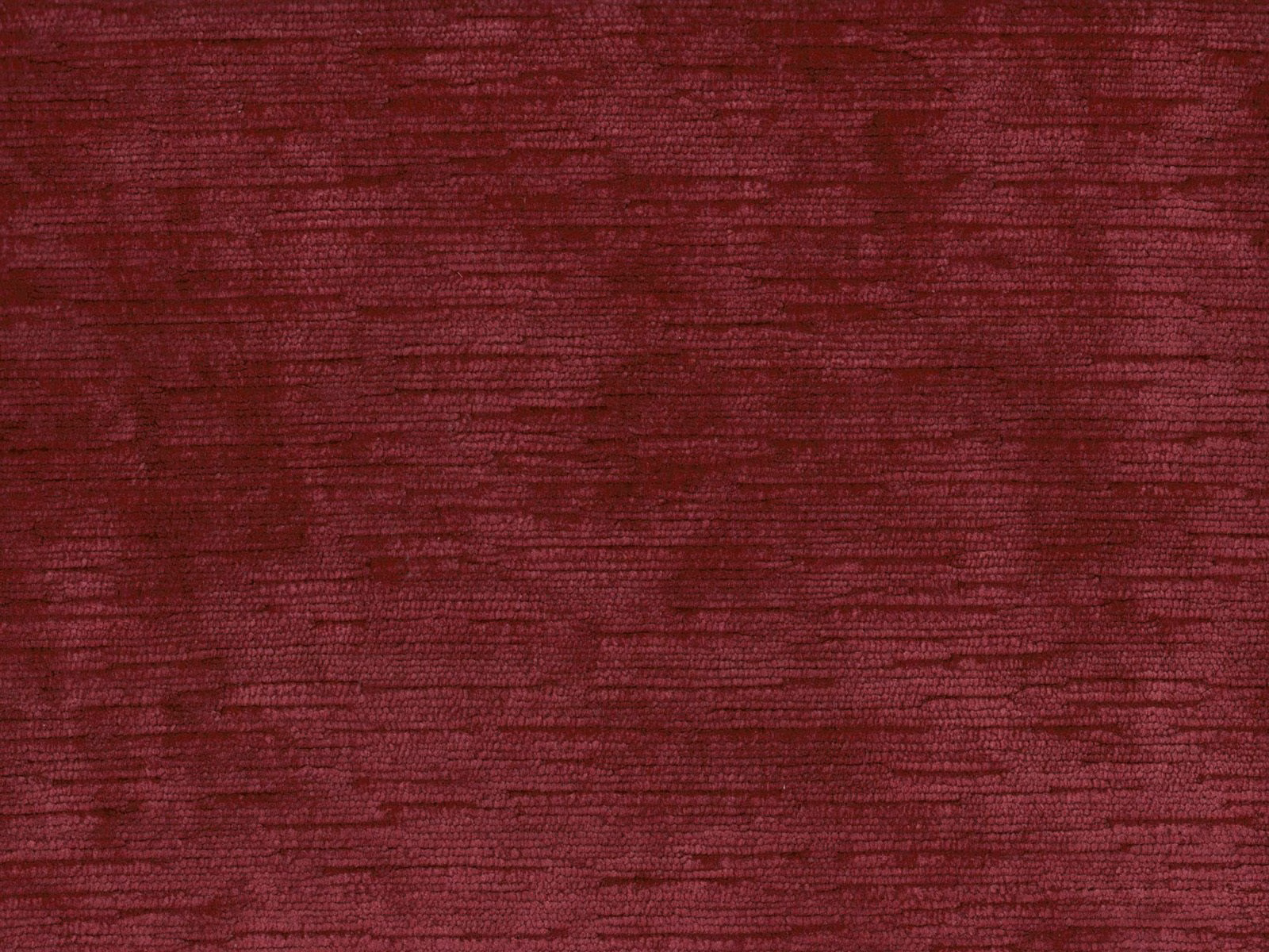 Deep burgundy velvet swatch with subtle horizontal striations and a softly lustrous pile