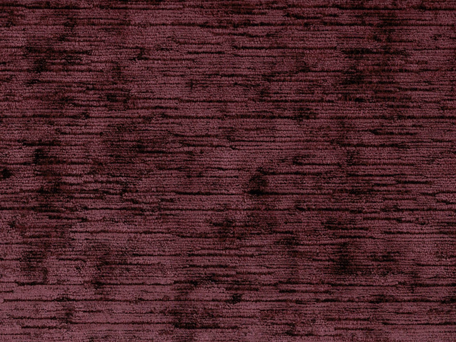Deep burgundy plum velvet with irregular horizontal striations and dark pile variation