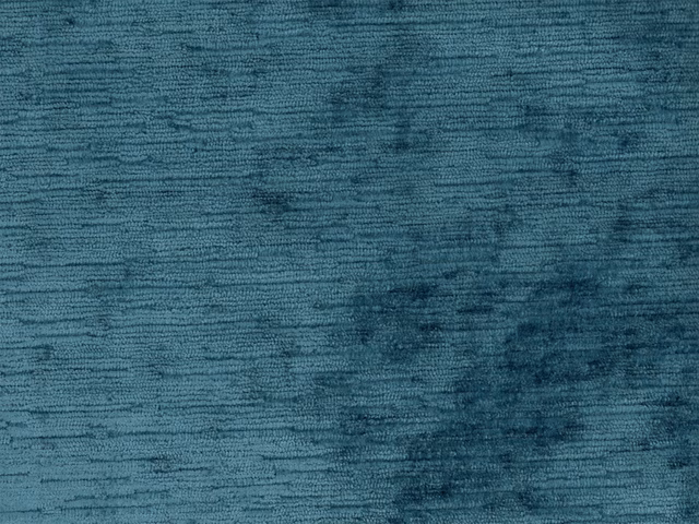 Deep blue-teal velvet with mottled shading and fine horizontal pile texture