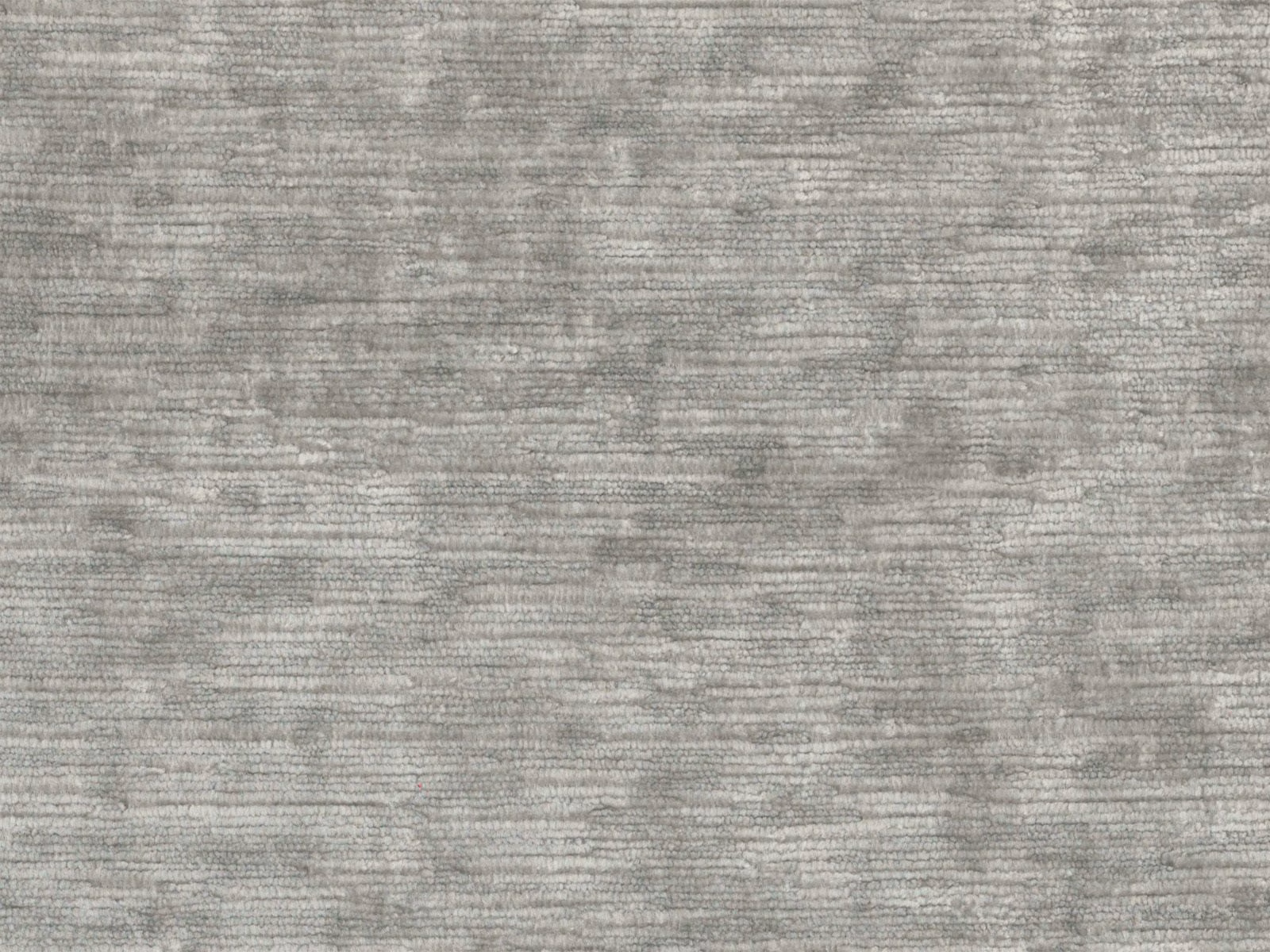 Cool silver-grey velvet with fine horizontal striations and softly mottled tonal texture