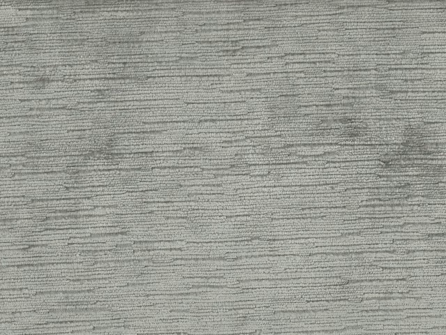 Soft grey-green velvet with fine horizontal striations and a gently varied pile