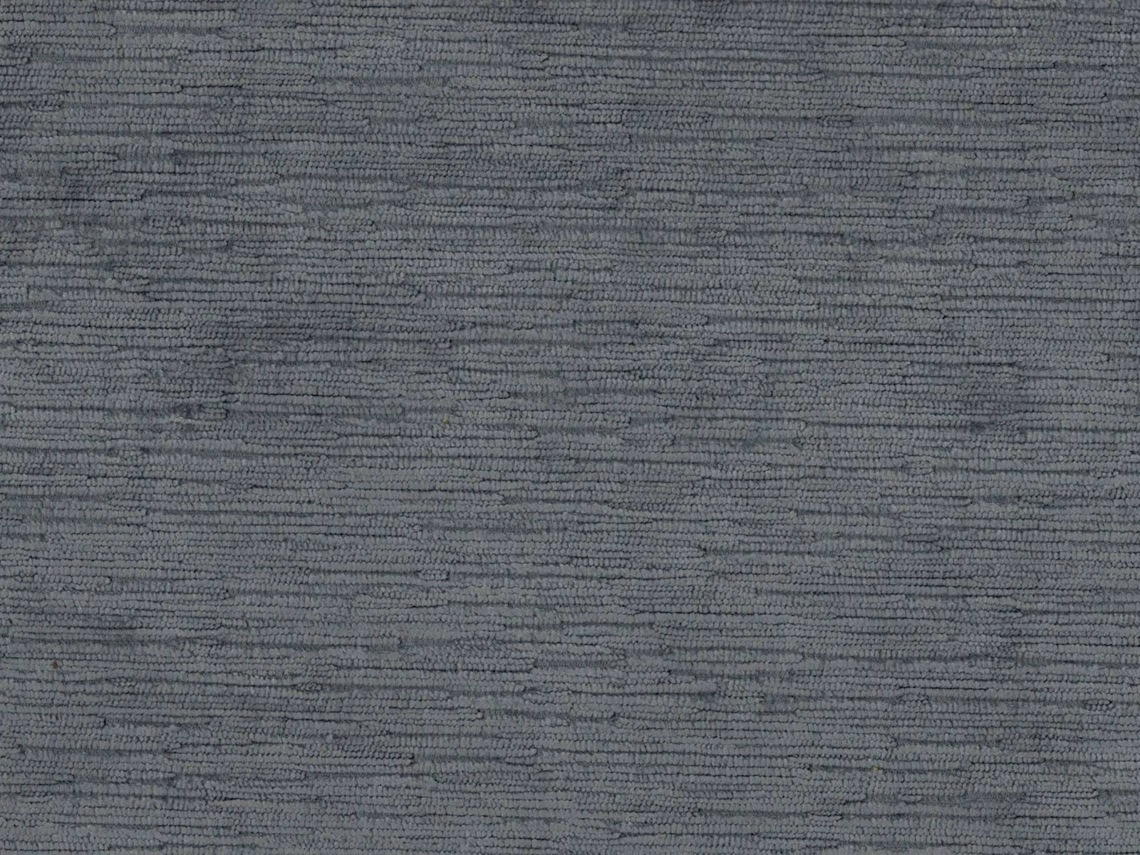 Charcoal-grey velvet with fine, uneven horizontal striations and a softly shaded surface